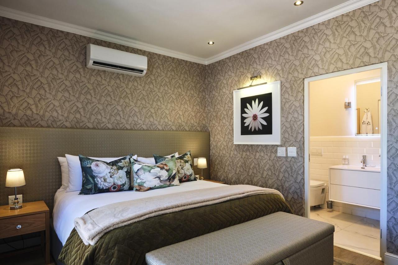 Alluvia Boutique Winery & Luxury Accommodation Stellenbosch Eksteriør bilde A bedroom at the Cape Heritage