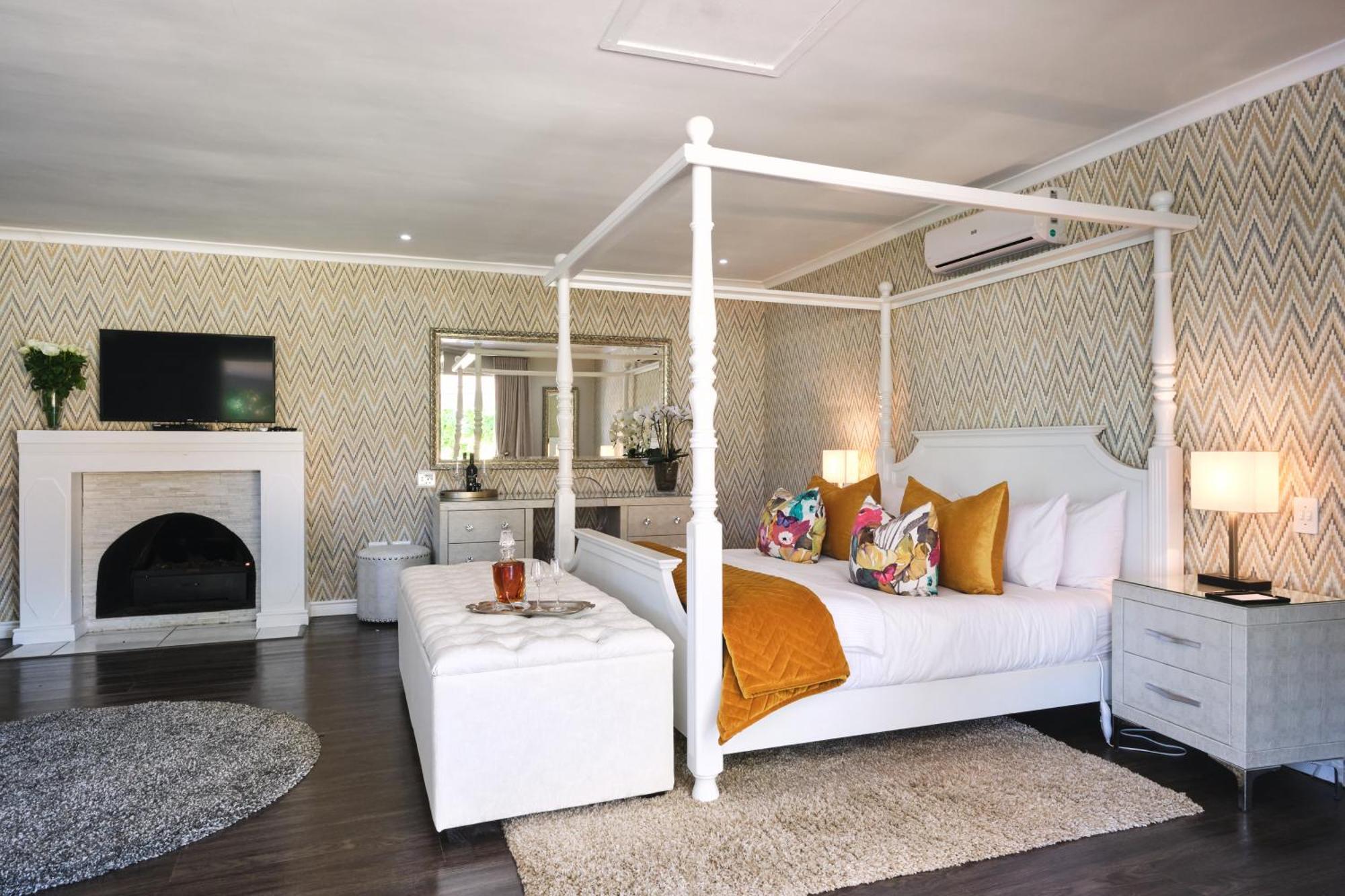 Alluvia Boutique Winery & Luxury Accommodation Stellenbosch Rom bilde A bedroom at the Cape Heritage